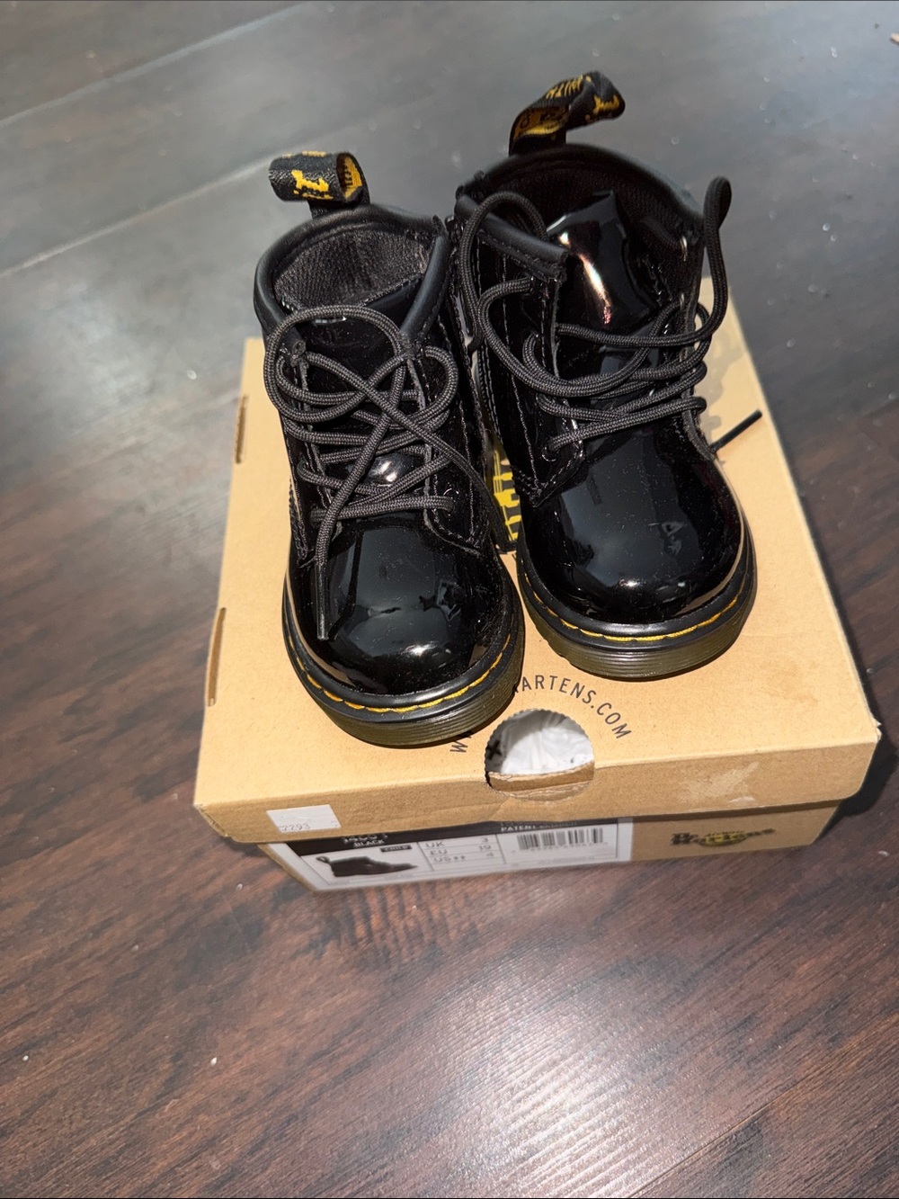 Dr. Martens Kids Black Patent Lace-Up Boots with Yellow Stitching